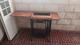 Maquina de coser antigua con mueble nuevo